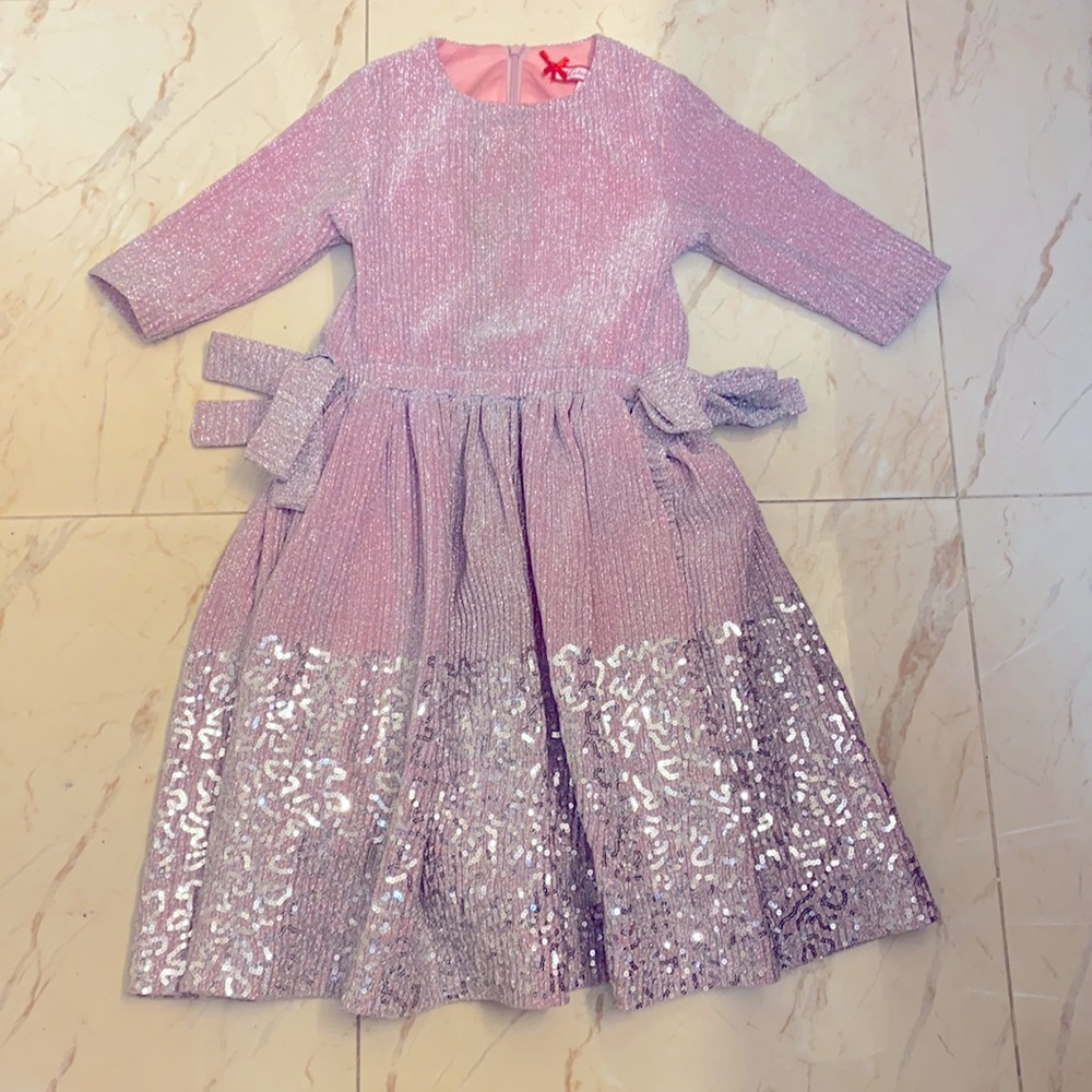 Little girls sparkly pink dress. it is not new but condition is like new.